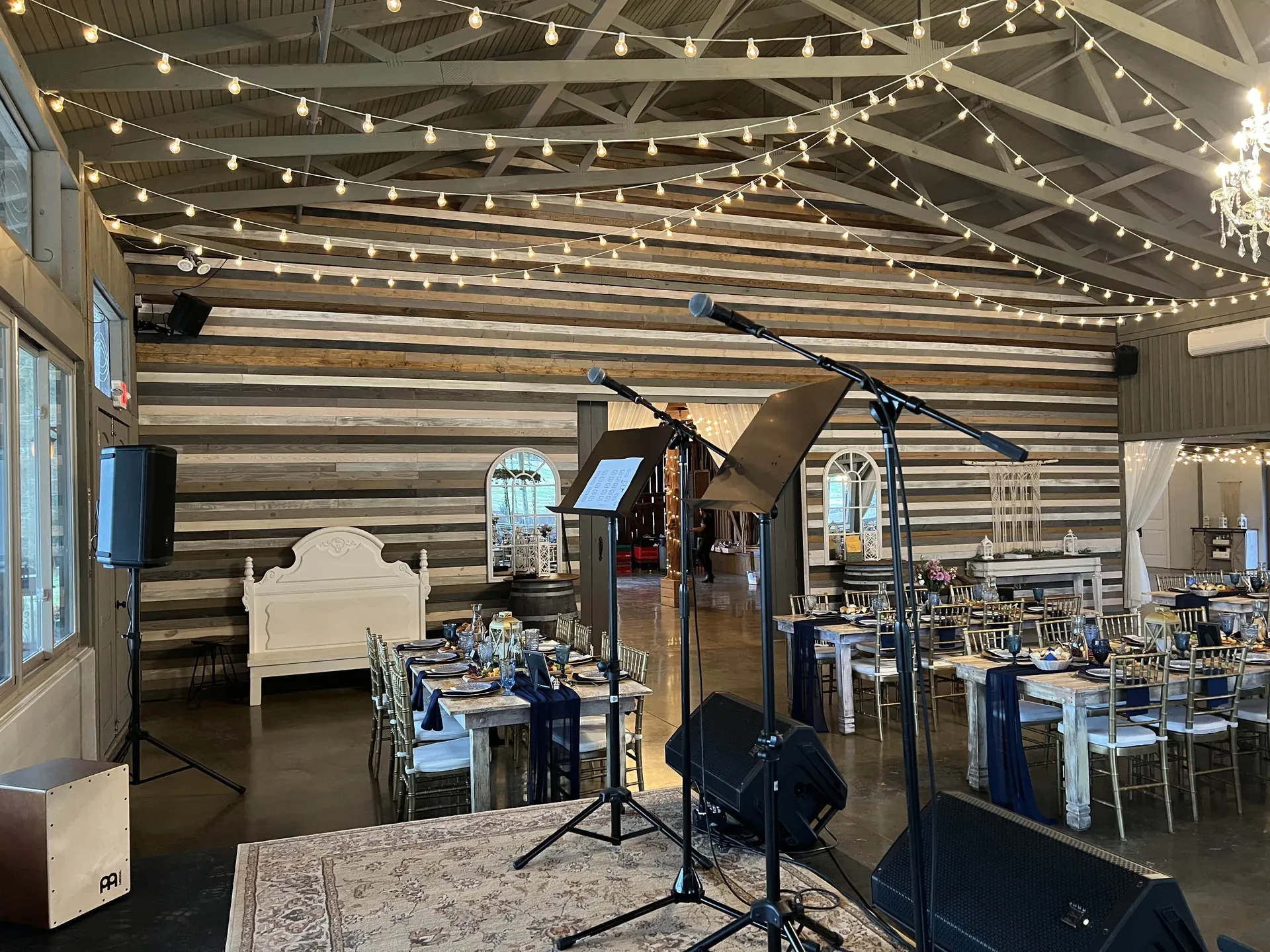 Barn wedding reception audio setup with PA speakers in Nashville