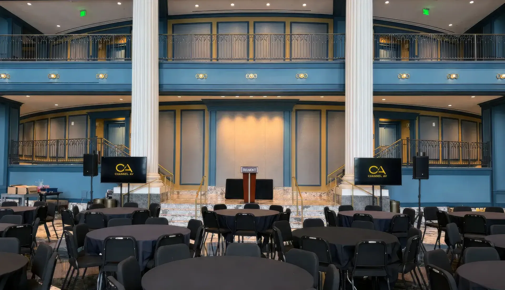 Channel AV event audio setup with PA speakers and microphone stands at an upscale Nashville venue