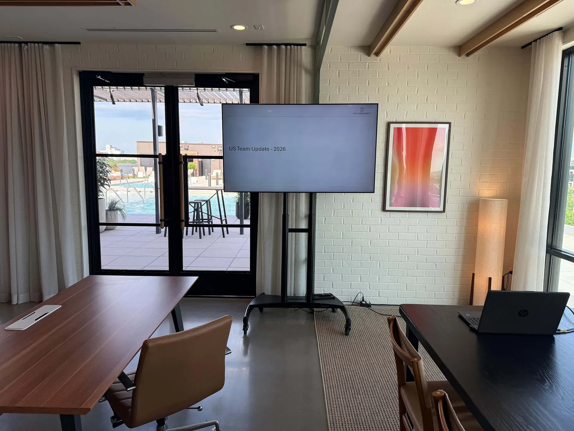 Corporate meeting room with TV display and presentation setup