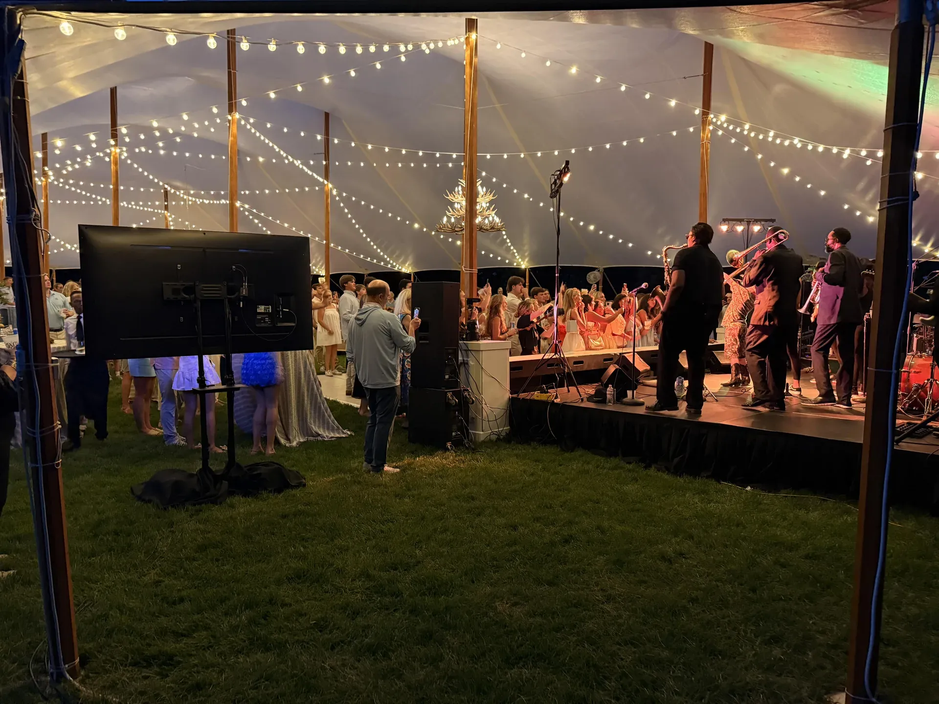 Tent event reception with live band and PA audio in Middle Tennessee