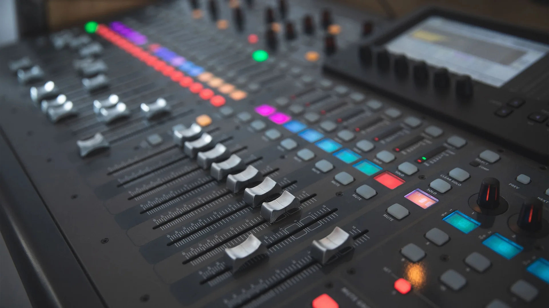 Behringer X32 soundboard fader controls up close
