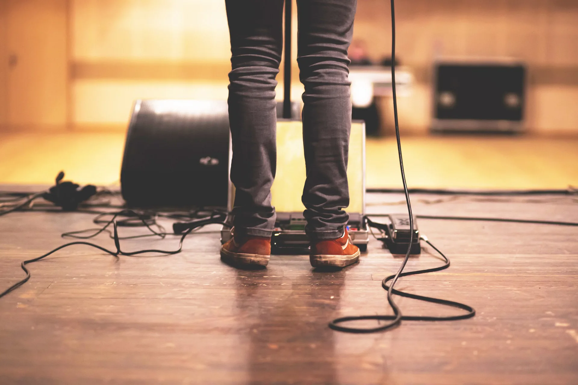 Stage monitor wedge speaker on the floor of a live event stage