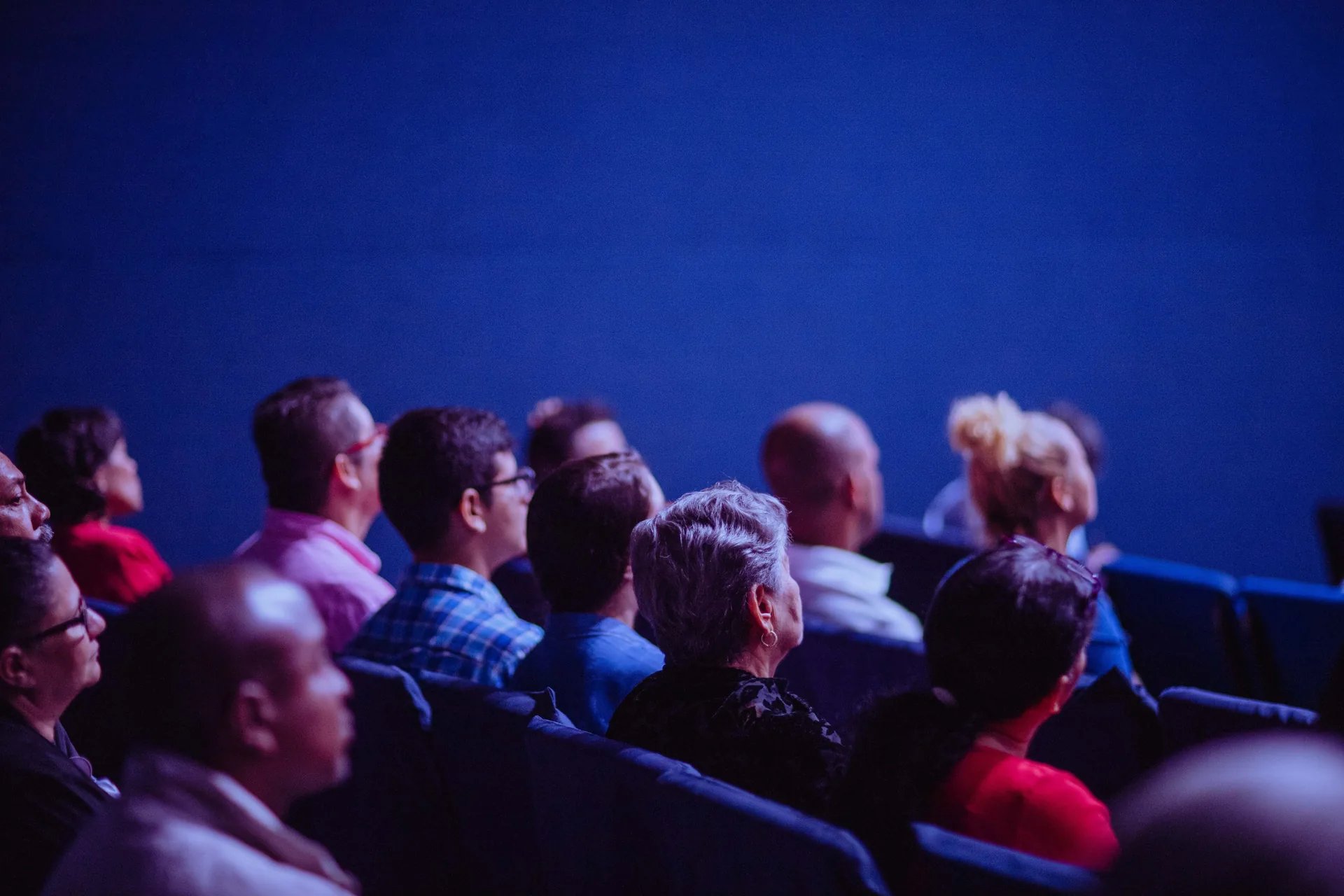 Attendees seated at a corporate conference