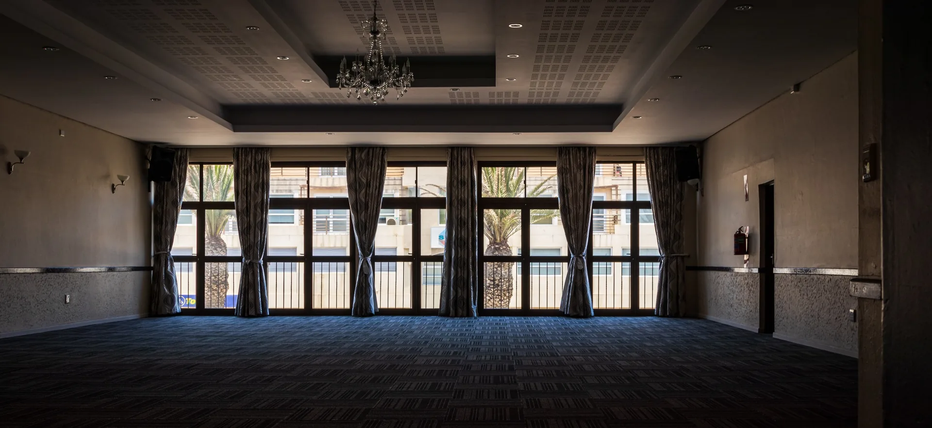 Empty venue space before event setup and audiovisual equipment installation