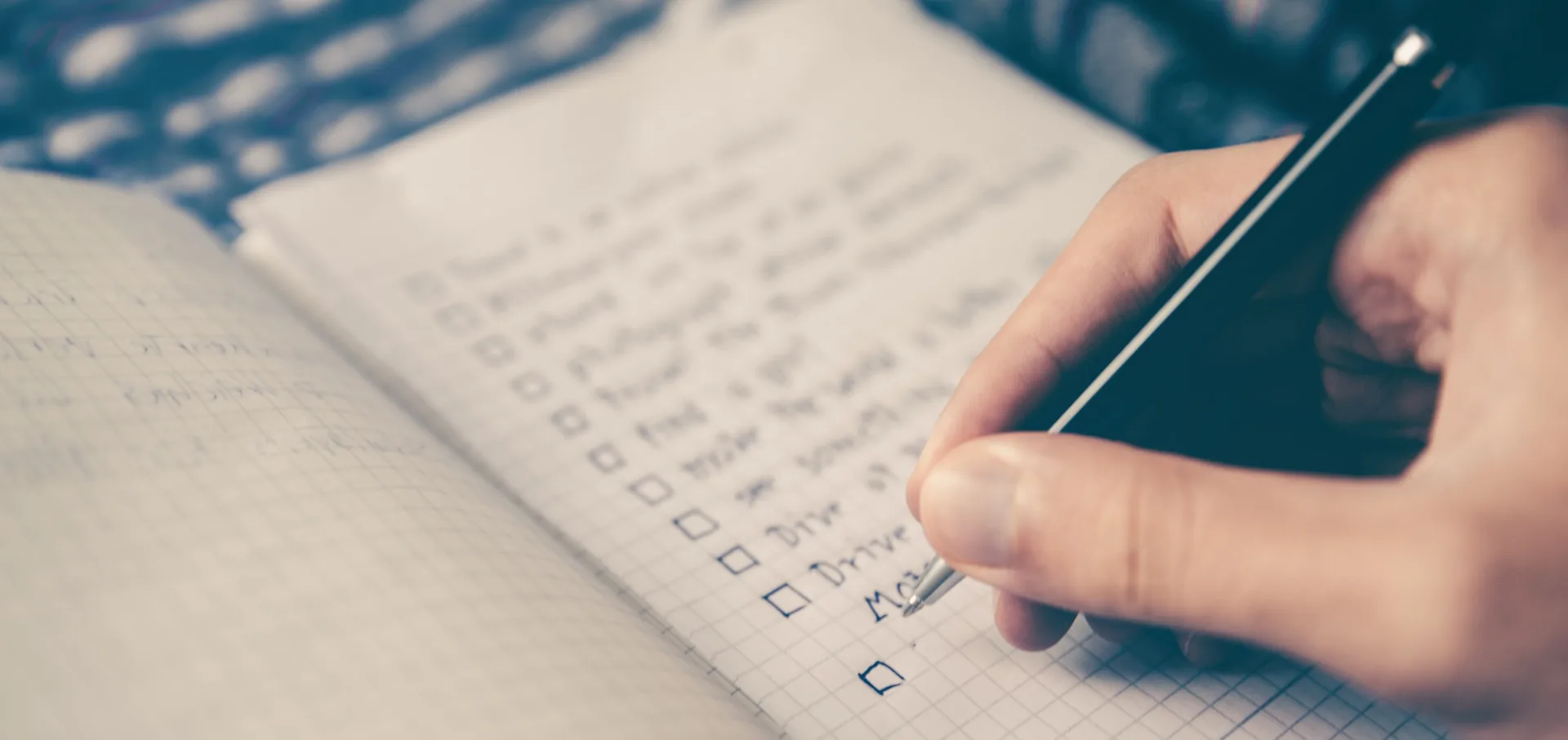 Event AV planning checklist on a clipboard