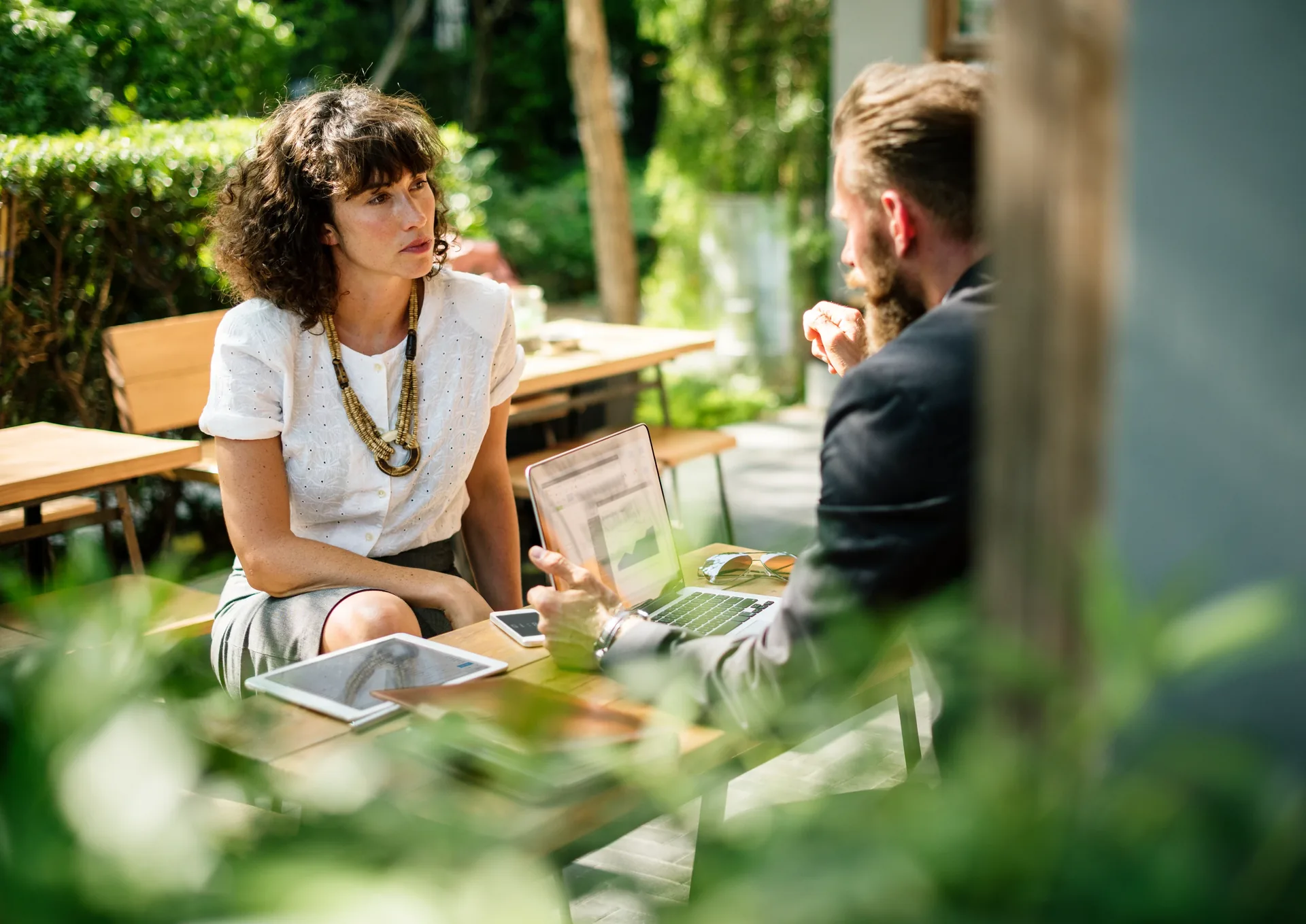 Event planner meeting with an AV account manager outdoors