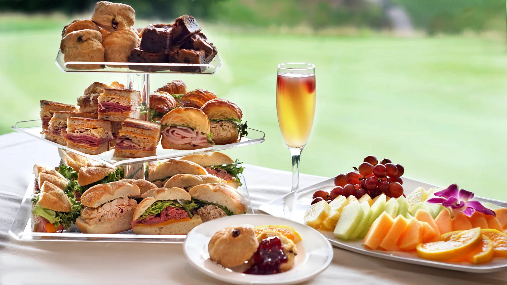 Assorted snack foods and appetizers arranged on a table for game day