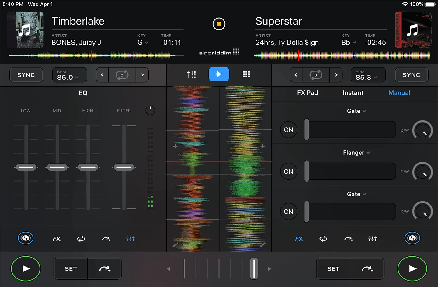 iPad DJ application interface with virtual turntable and mixing controls displayed