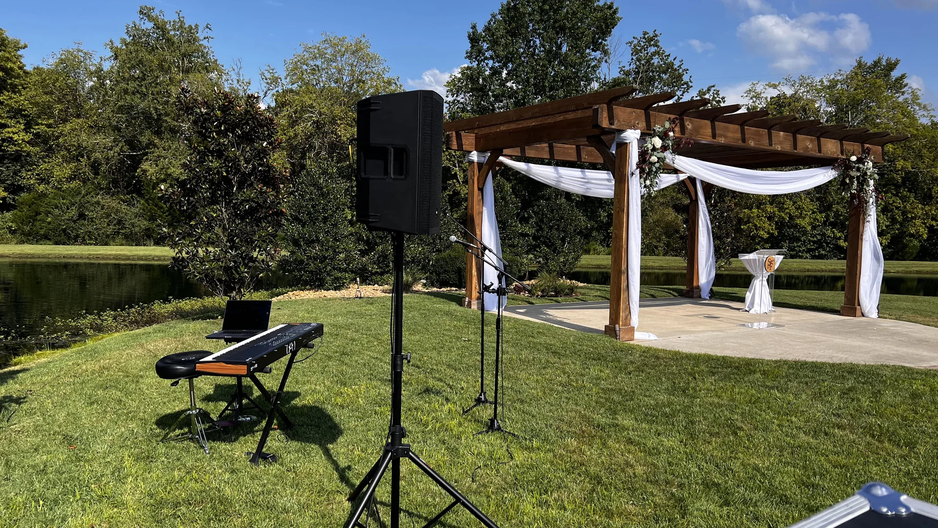 Lakeside wedding with professional audio speakers and AV equipment for sound coverage
