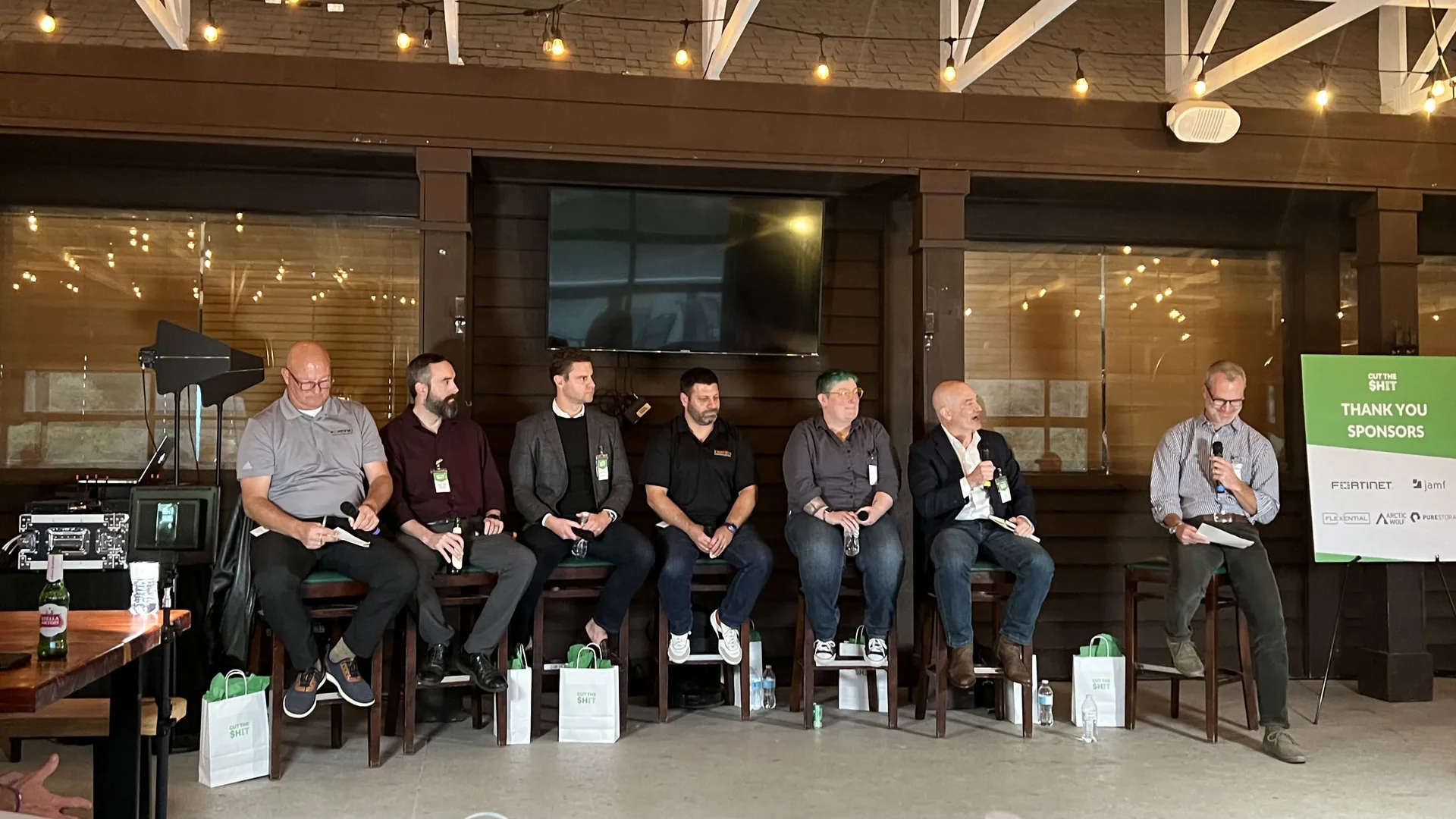 Panel discussion with wireless microphones and AV support for corporate event with multiple breakout spaces