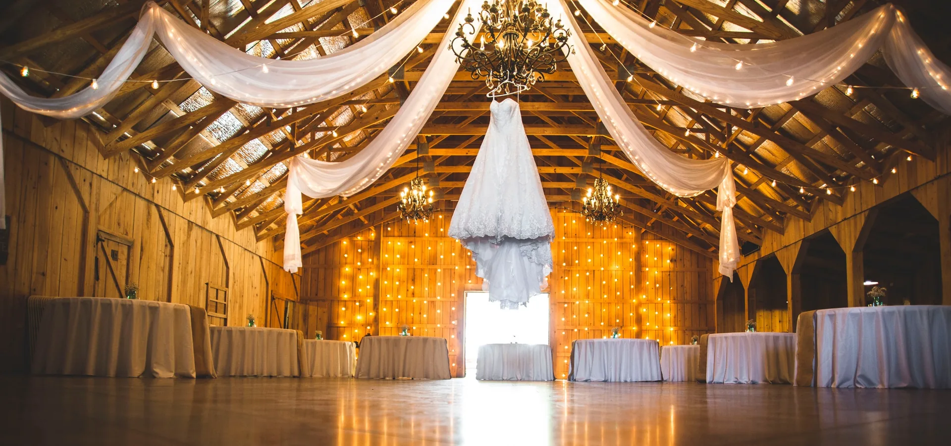 Rustic barn venue interior before event setup and decorations installation