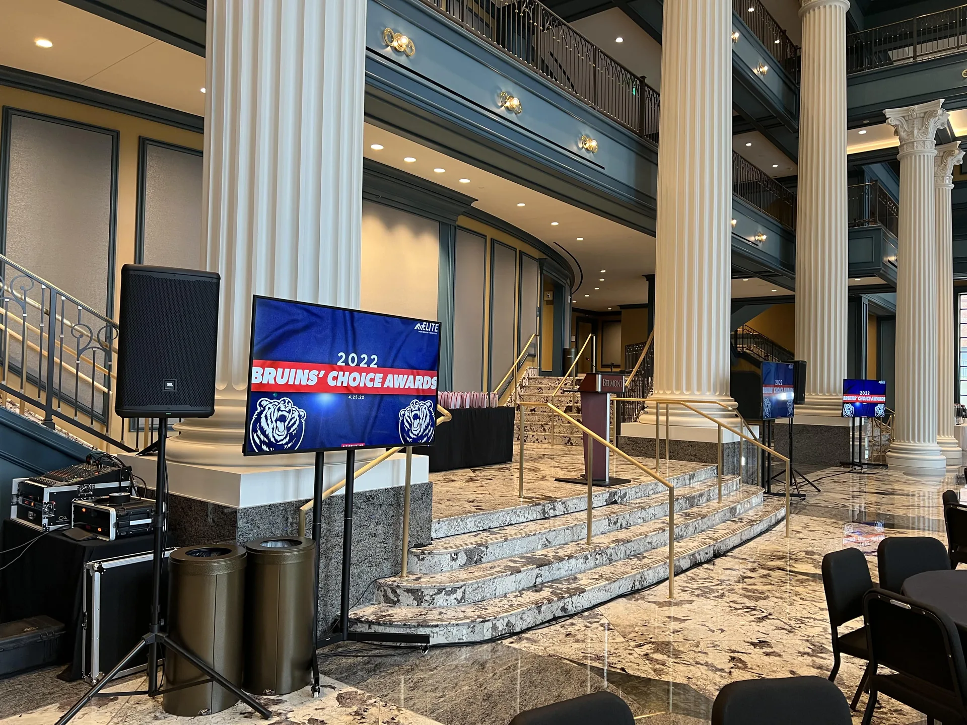TV display and PA audio setup for the 2022 Bruins' Choice Awards in a columned lobby