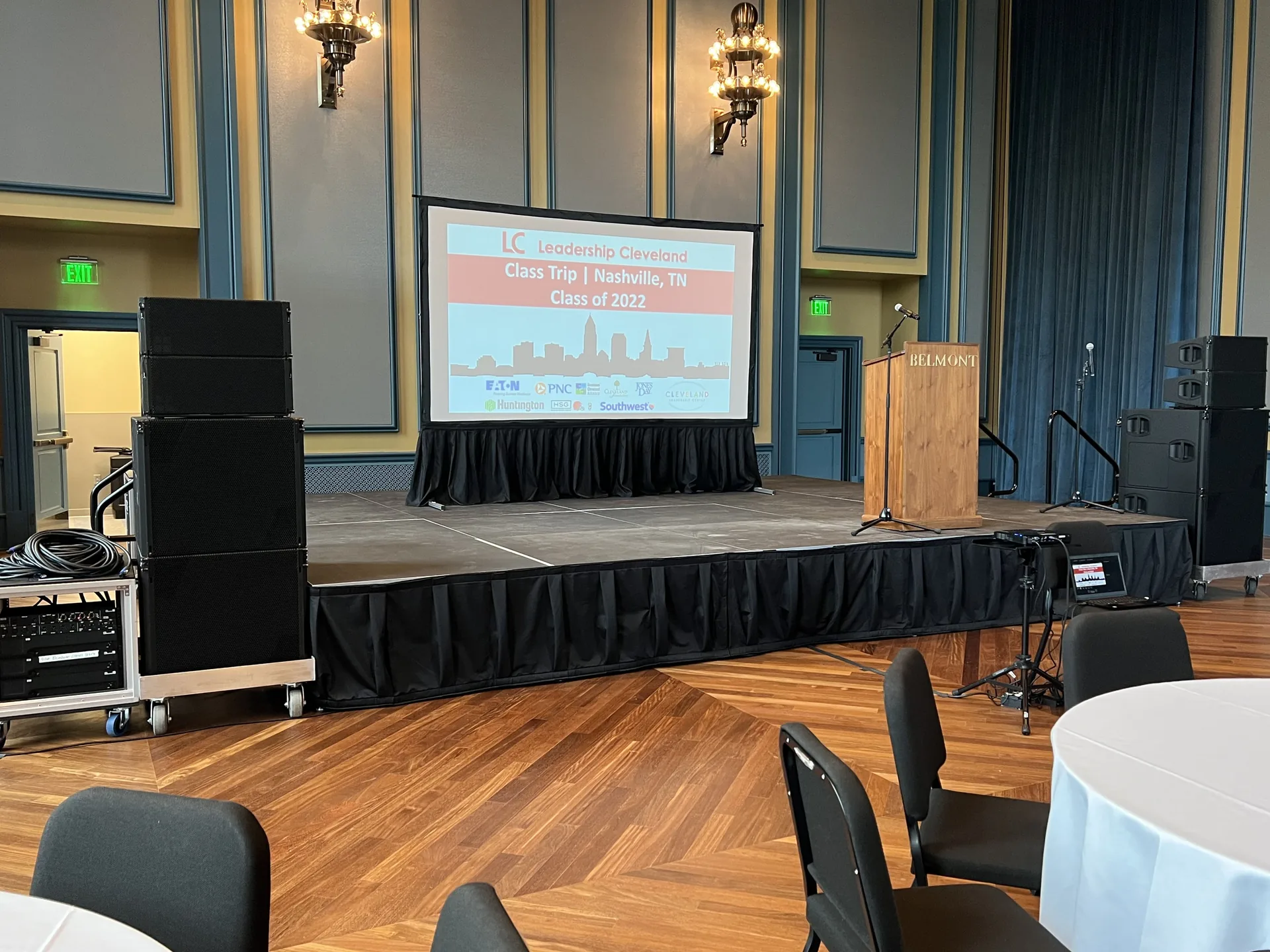 Conference stage setup for Leadership Cleveland in Nashville with sponsors displayed on screen
