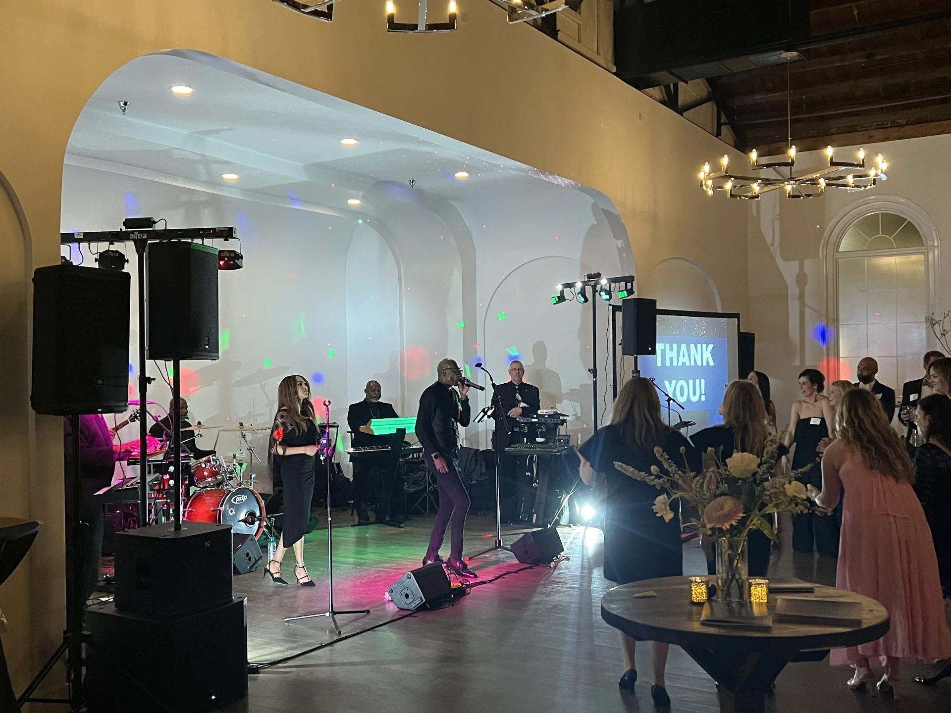 Live band performance with a PA sound system and projected visuals at Emerson Hall in Nashville