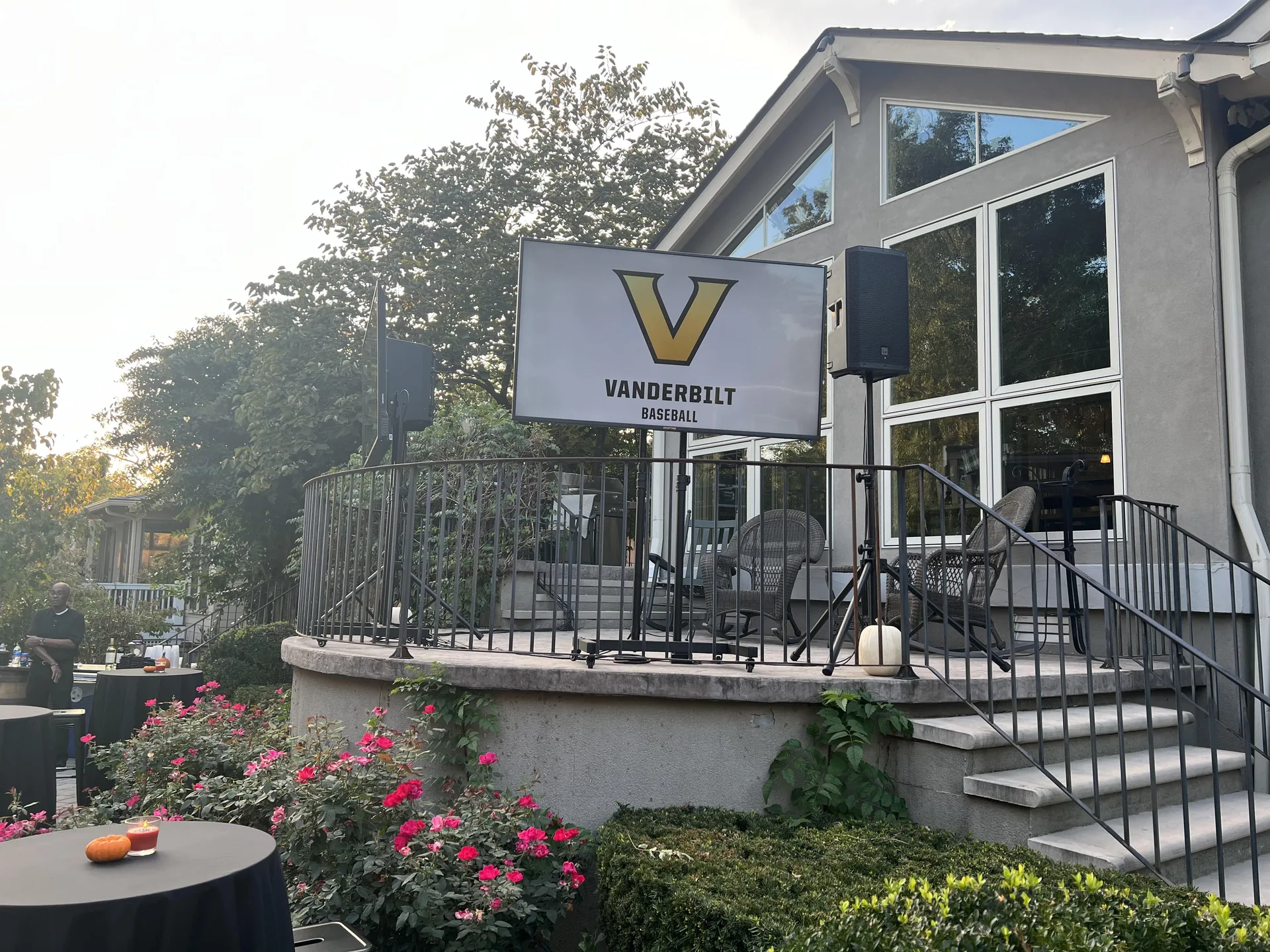 Outdoor Vanderbilt Baseball event with TV display, PA speaker and stage equipment
